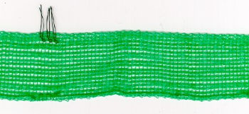 Picture of a High density (HDPE) polyethylene monofilament yarn as used for wind protection products